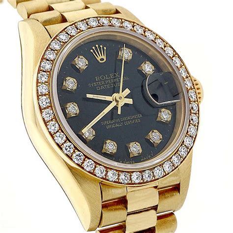 18k presidential rolex diamond bezel.